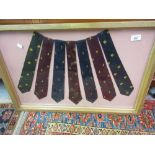 Gilt framed and glazed group of seven various ties of Gurkha Regiments