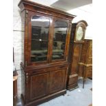 Victorian figured walnut marquetry inlaid and ormolu mounted bookcase, the moulded cornice above a