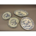 Chinese blue and white plate decorated with figures in a hunting scene, similar oval dish, Canton