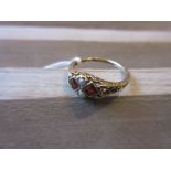 14ct Yellow gold garnet and split seed pearl set ring