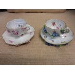 Two 19th Century Meissen floral encrusted cabinet cups and saucers Various chips to the flowers,