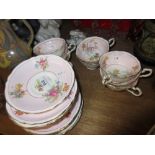 Set of eight Paragon floral decorated tea cups, saucers and plates
