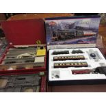 Two boxed Trix twin railway sets, Triang Railways box containing a quantity of various trains,