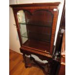 Mahogany display cabinet in 17th / 18th Century style, the moulded top above a glazed door enclosing