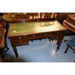 19th Century mahogany writing desk, the green leather inset moulded top above five drawers with