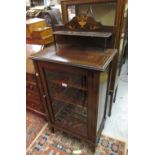 Edwardian rosewood and boxwood line inlaid music cabinet with a low shelf back above a single door