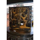19th Century Japanese black lacquered and gilt decorated table cabinet, the two doors opening to