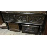 20th Century oak sideboard, the moulded top above three geometric moulded Jacobean style drawers