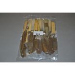 Collection of fourteen various mainly 19th Century silver butter knives with various mother of