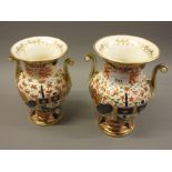 Two 19th Century English two handled vases decorated in red, green, blue and gilt (both with