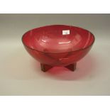 Modern cranberry glass fruit bowl on wooden stand 4.5ins high 11.25ins dia.