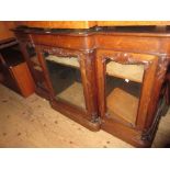 Victorian rosewood breakfront side cabinet with three glazed doors on a plinth base