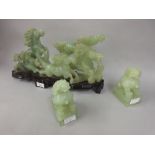 20th Century carved jadeite group of galloping horses together with a pair of similar figures of