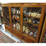 Edwardian mahogany satinwood crossbanded and line inlaid bookcase, the dentil moulded cornice