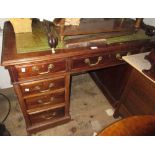 Late 19th early 20th Century mahogany twin pedestal desk having an arrangement of nine drawers