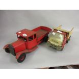 Early 20th to mid 20th Century Triang red painted toy open back truck and a Tonka tipper truck (at