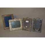 Four various modern silver mounted photograph frames