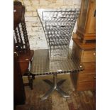 Modern metal six drawer chest and matching pedestal table