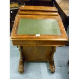 19th Century burr walnut Davenport having hinged writing slope with fitted interior above four
