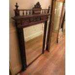 19th Century French oak overmantel mirror with a shaped surmount above a rectangular plate,