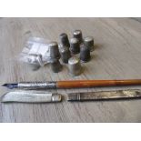 Seven various silver thimbles, three other thimbles, silver mounted wooden pen, pencil case (at