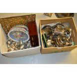 Two boxes containing a quantity of various silver plate and flatware including: a pair of silver