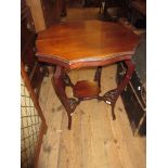 Edwardian circular mahogany two tier occasional table on cabriole supports