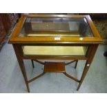 Edwardian mahogany line inlaid and crossbanded bijouterie cabinet on square tapering supports with
