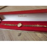 Ladies Omega 9ct gold cased wristwatch with 9ct gold bracelet strap in original box 13g