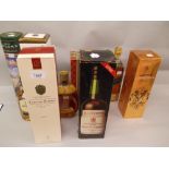 Boxed bottle of Laurent Perrier champagne, another Pol Roger champagne, Dimple Scotch whisky and