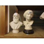 Bisque bust of Charlotte Bronte on a pottery plinth, 9ins high, together with a small plaster bust