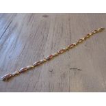 9ct Yellow gold ruby and diamond set bracelet