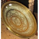Benares circular brass tray on a folding wooden stand