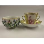19th Century German porcelain two handled cup and saucer painted with cherubs, together with a