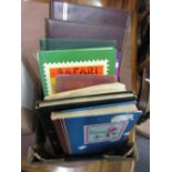 G.B. and Canadian unused stamp albums, two other unused stamp albums, three books on stamps and
