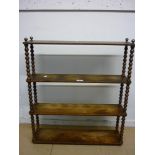 Stained beechwood four tier wall bracket with bobbin turned uprights