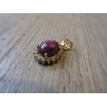 9ct Yellow gold cabochon amethyst and diamond set pendant