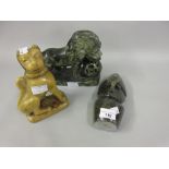 African soapstone carving of a stylised head, signed Cuth, together with two soapstone figures of