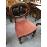 Set of four Victorian mahogany dining chairs with button upholstered seats and turned front supports