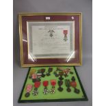 Three French Legion D' Honneur medals including one framed with citation, together with a group of