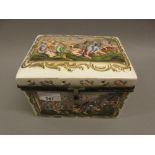 Naples porcelain gilt metal mounted casket decorated in polychrome relief with panels of battle