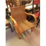 Mid 20th Century beechwood open elbow chair with string back and seat