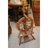 Late 19th Century spinning wheel, 20th Century loom and an African native loom