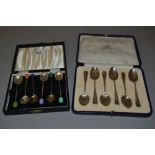 Cased set of six silver bean handled coffee spoons and a cased set of six silver teaspoons