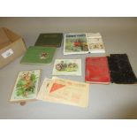 Quantity of small autograph albums, rations books, Christmas cards, postcards and a 1950's timetable