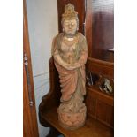 Large oriental carved and painted hardwood figure of a standing Buddha, 44ins high