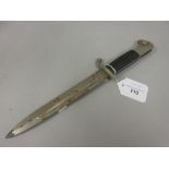German bayonet with stylised eagles head pommel, the 7.5in blade inscribed W.K.C. (minus scabbard)