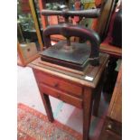 19th Century iron book press on a wooden two drawer stand