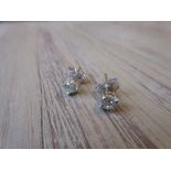 Pair of 18ct white gold diamond solitaire ear studs, approximately 0.50ct total