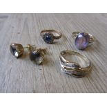 Three various 9ct gold dress rings, together with a pair of gilt metal stud earrings